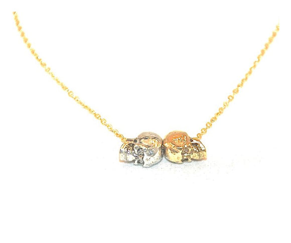 Tiny Necklace with Silver and Gold Skulls